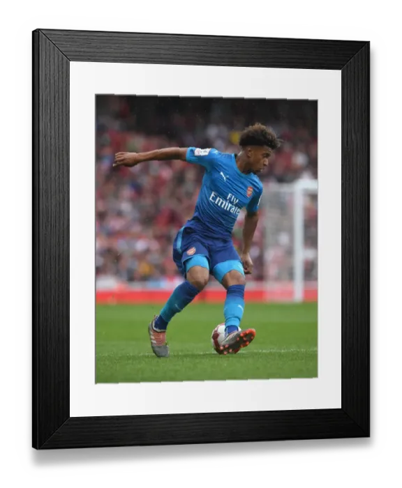 Framed Print : Reiss Nelson Shines in Arsenal's Emirates Cup Victory over SL Benfica