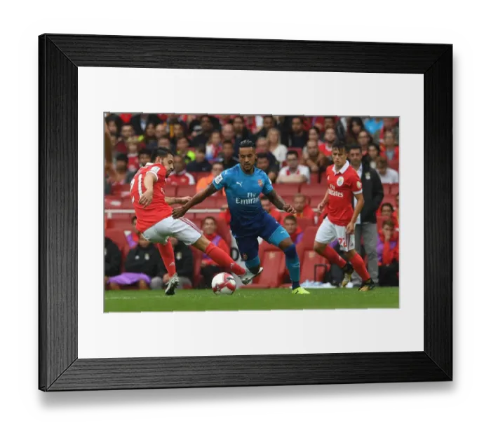 Framed Print : Theo Walcott Outmaneuvers Pizzi in Arsenal's Emirates Cup Clash against SL Benfica Framed Print : Theo Walcott Outmaneuvers Pizzi in Arsenal's Emirates Cup Clash against SL Benfica