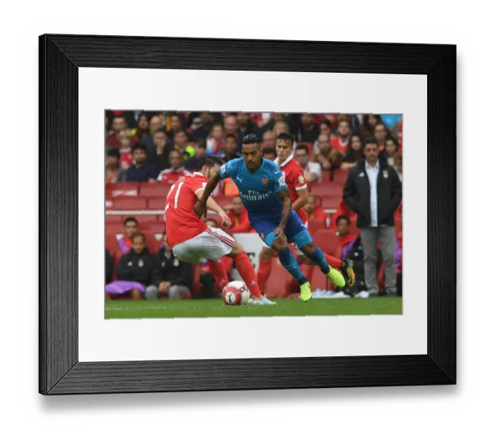 Framed Print : Theo Walcott's Slick Move: Arsenal's Emirates Cup Win against Benfica