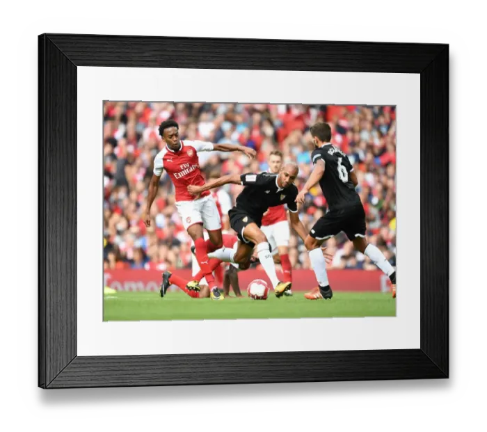 Framed Print : Arsenal vs Sevilla: Clash between Joe Willock and Steven N'Zonzi at the Emirates Cup