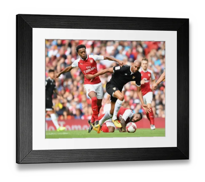 Framed Print : Clash at the Emirates: Arsenal's Joe Willock vs Sevilla's Steven N'Zonzi Framed Print : Clash at the Emirates: Arsenal's Joe Willock vs Sevilla's Steven N'Zonzi