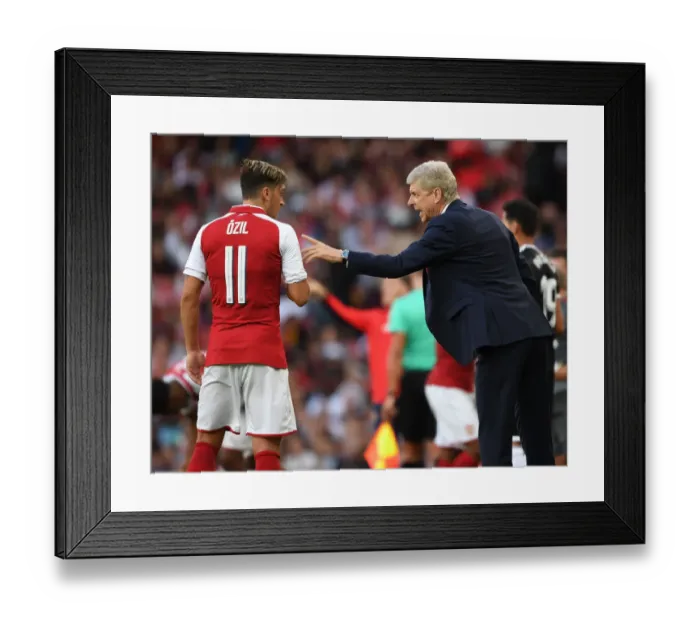 Framed Print : Arsene Wenger Conferring with Mesut Ozil during Arsenal's Emirates Cup Match against Sevilla, 2017 Framed Print : Arsene Wenger Conferring with Mesut Ozil during Arsenal's Emirates Cup Match against Sevilla, 2017