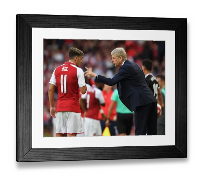 Framed Print : Arsene Wenger Consults Mesut Ozil During Arsenal's Emirates Cup Clash Against Sevilla