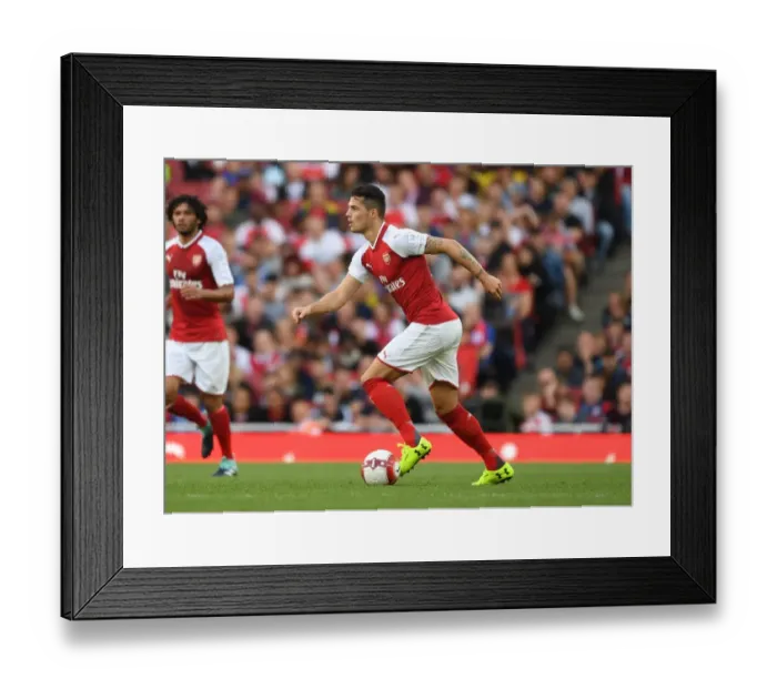 Framed Print : Granit Xhaka: Arsenal's Midfield Maestro in Action against Sevilla at the Emirates Cup 2017-18 Framed Print : Granit Xhaka: Arsenal's Midfield Maestro in Action against Sevilla at the Emirates Cup 2017-18