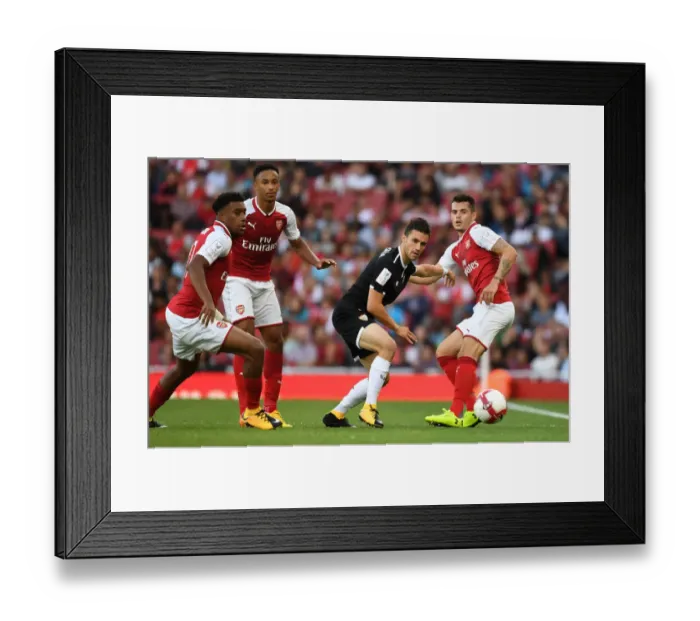 Framed Print : Arsenal vs Sevilla: Clash between Iwobi, Xhaka, Bramall, and Corchia at the Emirates Cup