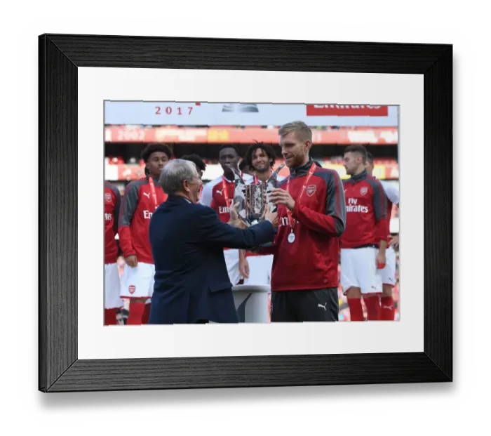Framed Print : Per Mertesacker Lifts Emirates Cup Trophy: Arsenal v Sevilla, 2017