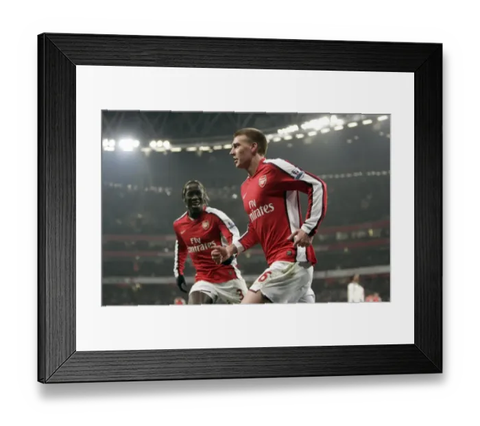 Framed Print : Bendtner and Sagna: Arsenal's Unstoppable Duo Celebrates 1:0 Win Over Bolton Wanderers Framed Print : Bendtner and Sagna: Arsenal's Unstoppable Duo Celebrates 1:0 Win Over Bolton Wanderers