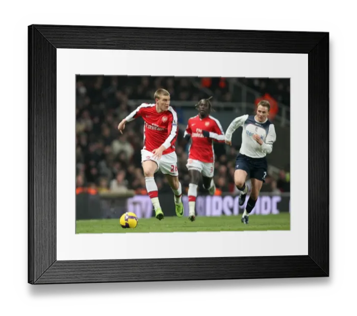 Framed Print : Nicklas Bendtner (Arsenal) Matt Taylor (Bolton) Framed Print : Nicklas Bendtner (Arsenal) Matt Taylor (Bolton)