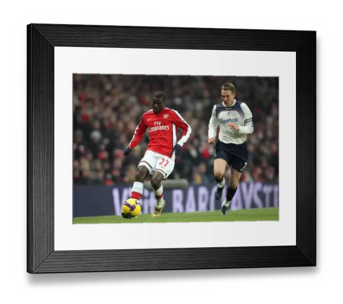Framed Print : Emmanuel Eboue (Arsenal) Matt Taylor (Bolton) Framed Print : Emmanuel Eboue (Arsenal) Matt Taylor (Bolton)