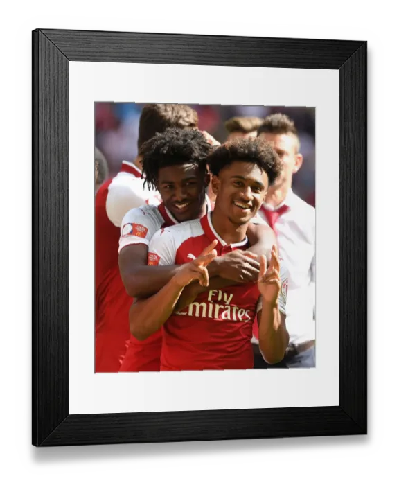 Framed Print : Arsenal's Young Stars Maitland-Niles and Nelson Celebrate FA Community Shield Victory
