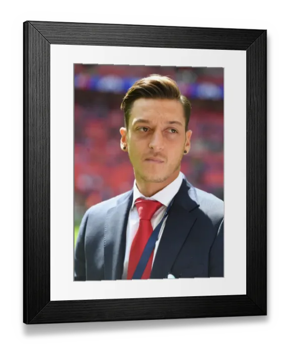 Framed Print : Mesut Ozil's Unwavering Concentration before Arsenal's FA Community Shield Clash against Chelsea (2017-18)