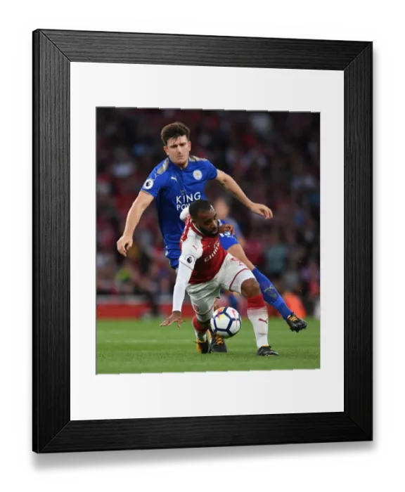 Framed Print : Arsenal's Lacazette Clashes with Leicester's Maguire in Premier League Showdown Framed Print : Arsenal's Lacazette Clashes with Leicester's Maguire in Premier League Showdown