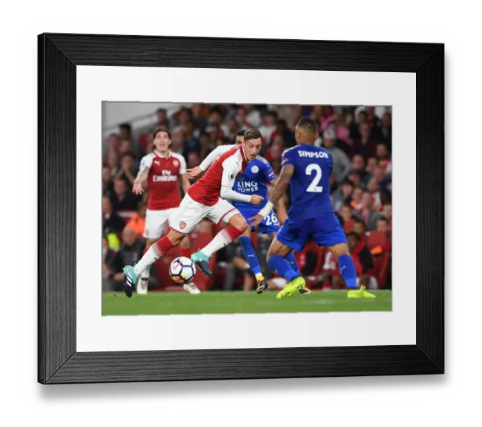 Framed Print : Mesut Ozil vs. Danny Simpson: Intense Battle at Arsenal's Emirates Stadium (Arsenal v Leicester City 2017-18) Framed Print : Mesut Ozil vs. Danny Simpson: Intense Battle at Arsenal's Emirates Stadium (Arsenal v Leicester City 2017-18)