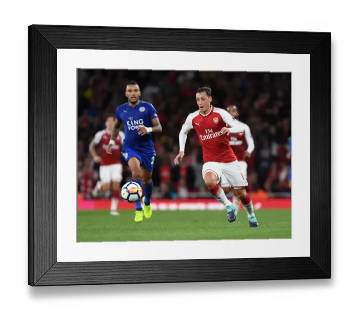 Framed Print : Mesut Ozil's Slick Move: Outsmarting Danny Simpson in Premier League Action Framed Print : Mesut Ozil's Slick Move: Outsmarting Danny Simpson in Premier League Action