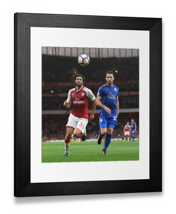 Framed Print : Arsenal's Mohamed Elneny vs. Leicester's Christian Fuchs: A Premier League Battle Framed Print : Arsenal's Mohamed Elneny vs. Leicester's Christian Fuchs: A Premier League Battle