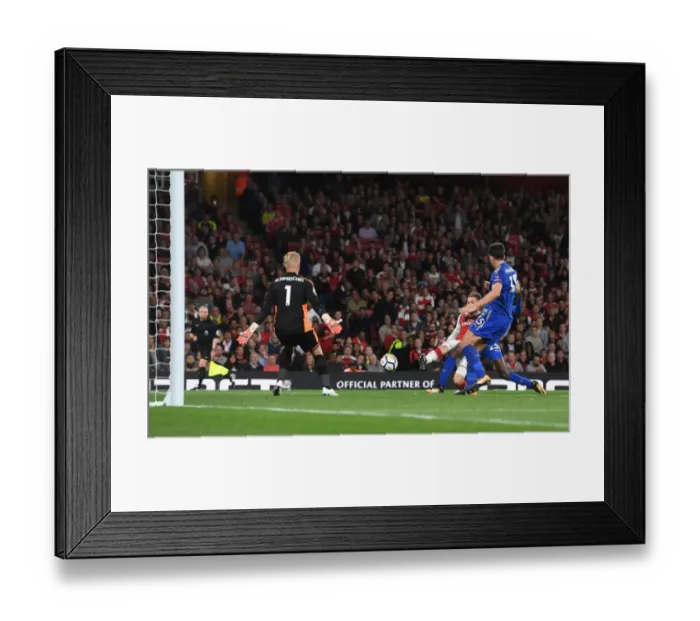 Framed Print : Aaron Ramsey Scores Thrilling Goal Past Kasper Schmeichel in Arsenal's Victory over Leicester City