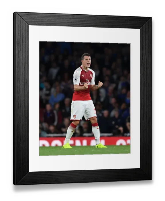 Framed Print : Granit Xhaka's Triumph: Arsenal's Victory Celebration vs. Leicester City, 2017-18 Premier League Framed Print : Granit Xhaka's Triumph: Arsenal's Victory Celebration vs. Leicester City, 2017-18 Premier League