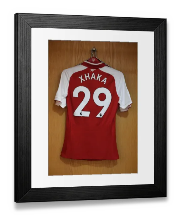 Framed Print : Arsenal FC: Granit Xhaka's Jersey in Arsenal Changing Room Before Arsenal vs Leicester City (2017-18)