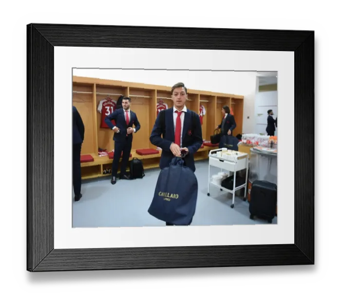 Framed Print : Mesut Ozil: Arsenal Home Changing Room before Arsenal vs Leicester City (2017-18)