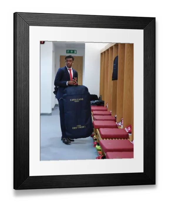 Framed Print : Arsenal's Alex Iwobi in the Home Changing Room - Arsenal vs Leicester City, Premier League 2017-18