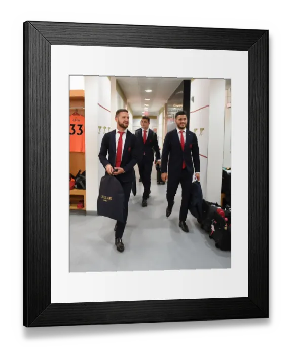 Framed Print : Arsenal's Mustafi and Kolasinac in the Home Team Huddle before Arsenal v Leicester City (2017-18)