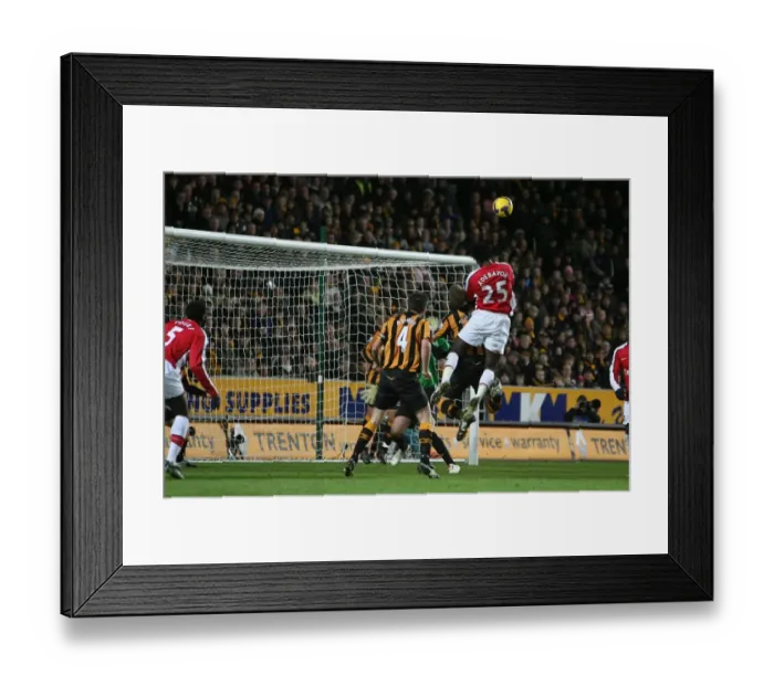 Framed Print : Emmanuel Adebayor heads over Hull goalkeeper Boaz Myhill