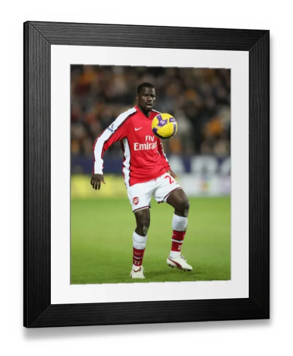 Framed Print : Emmanuel Eboue in Action: Arsenal's Dominant Performance Against Hull City (17 / 1 / 2009)