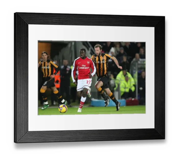 Framed Print : Emmanuel Eboue (Arsenal) Ian Ashbee (Hull) Framed Print : Emmanuel Eboue (Arsenal) Ian Ashbee (Hull)