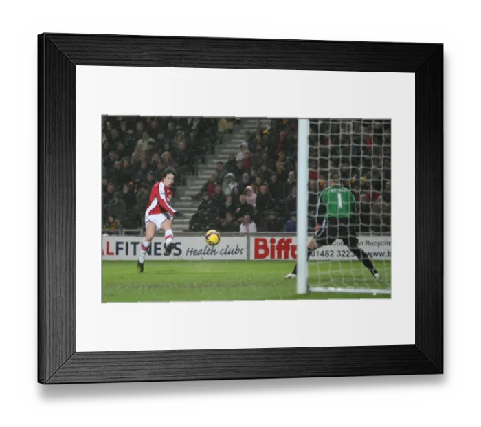 Framed Print : Samir Nasri shoots past Boaz Myhill to score the 2nd Arsenal goal Framed Print : Samir Nasri shoots past Boaz Myhill to score the 2nd Arsenal goal