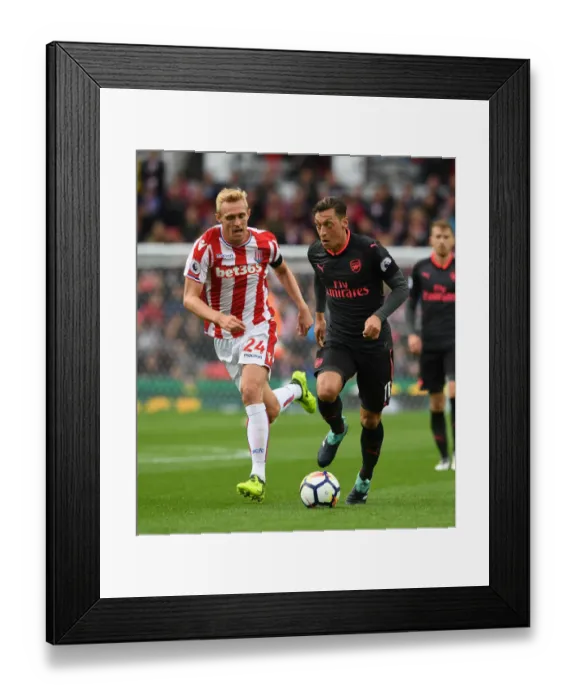 Framed Print : Mesut Ozil vs Darren Fletcher: Clash at the Bet365 Stadium - Stoke City vs Arsenal, Premier League 2017-18 Framed Print : Mesut Ozil vs Darren Fletcher: Clash at the Bet365 Stadium - Stoke City vs Arsenal, Premier League 2017-18