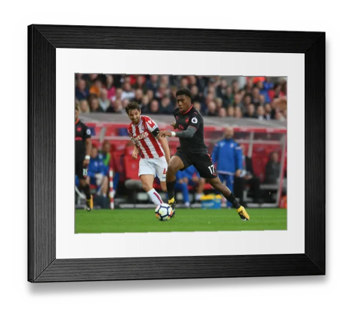 Framed Print : Clash of Midfielders: Iwobi vs Allen - Stoke City vs Arsenal, Premier League 2017-18 Framed Print : Clash of Midfielders: Iwobi vs Allen - Stoke City vs Arsenal, Premier League 2017-18