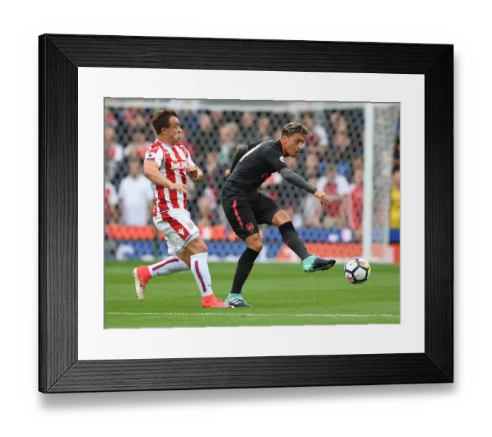 Framed Print : Mesut Ozil vs. Xherdan Shaqiri: Battle at the Bet365 Stadium - Stoke City vs. Arsenal, Premier League 2017-18