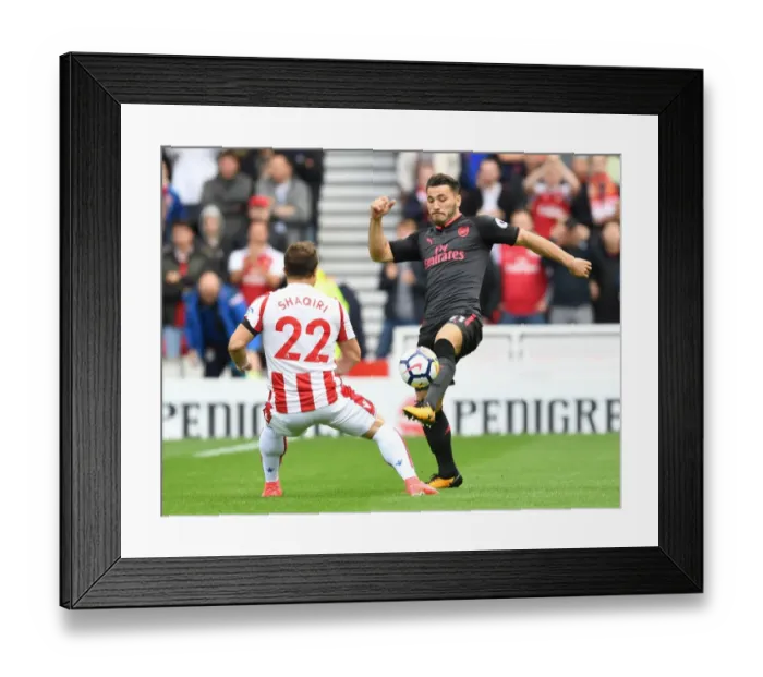 Framed Print : Sead Kolasinac vs. Xherdan Shaqiri: A Battle at the Bet365 Stadium - Stoke City vs. Arsenal, Premier League 2017-18 Framed Print : Sead Kolasinac vs. Xherdan Shaqiri: A Battle at the Bet365 Stadium - Stoke City vs. Arsenal, Premier League 2017-18