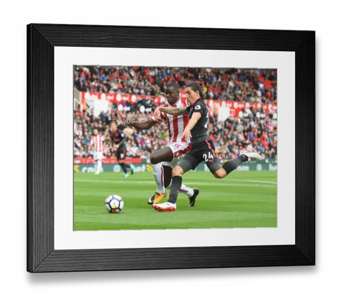 Framed Print : Clash of Defenders: Hector Bellerin vs. Kurt Zouma - Stoke City vs. Arsenal, Premier League 2017-18