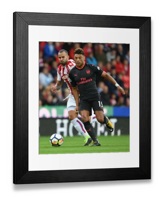 Framed Print : Alex Oxlade-Chamberlain's Slick Moves: Outsmarting Jese in Arsenal's Premier League Victory, 2017-18 Framed Print : Alex Oxlade-Chamberlain's Slick Moves: Outsmarting Jese in Arsenal's Premier League Victory, 2017-18