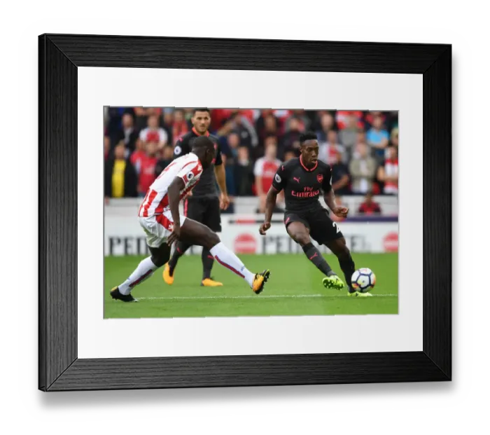 Framed Print : Danny Welbeck vs Kurt Zouma: Intense Battle in Stoke City vs Arsenal Premier League Clash Framed Print : Danny Welbeck vs Kurt Zouma: Intense Battle in Stoke City vs Arsenal Premier League Clash