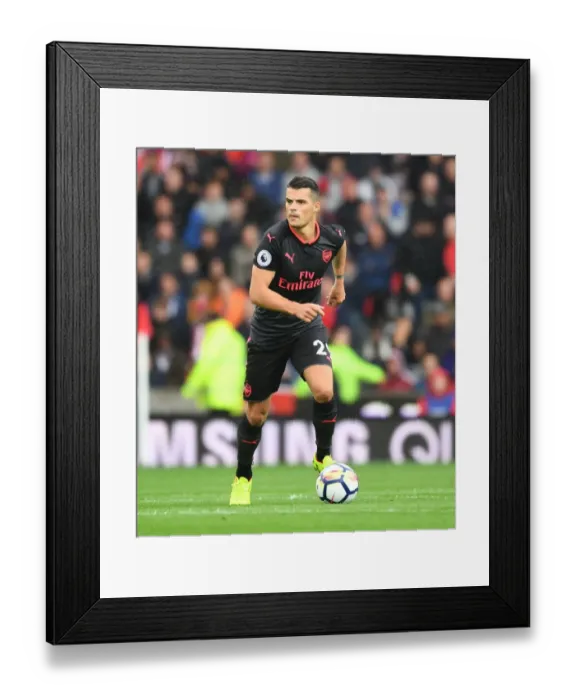 Framed Print : Granit Xhaka: Arsenal's Midfield Maestro in Action Against Stoke City, Premier League 2017-18