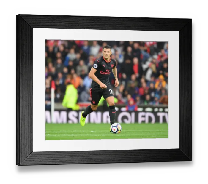 Framed Print : Granit Xhaka: In Action for Arsenal Against Stoke City, Premier League 2017-18 Framed Print : Granit Xhaka: In Action for Arsenal Against Stoke City, Premier League 2017-18