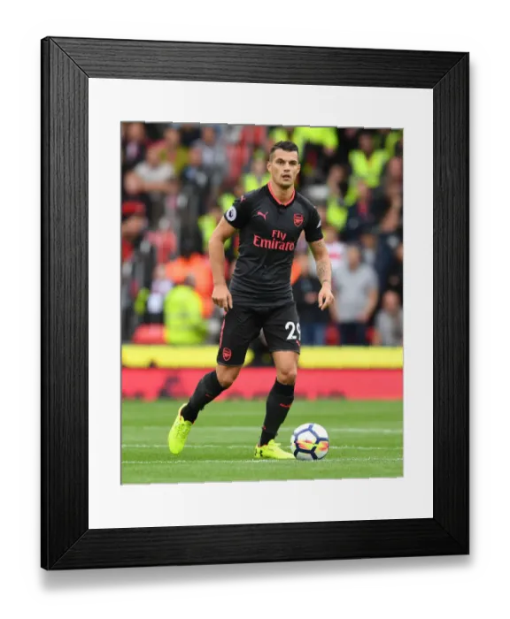 Framed Print : Granit Xhaka: Arsenal Star in Action Against Stoke City, Premier League 2017-18