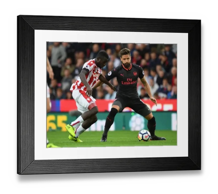 Framed Print : Giroud vs Diouf: Intense Battle at Stoke City vs Arsenal, Premier League 2017-18 Framed Print : Giroud vs Diouf: Intense Battle at Stoke City vs Arsenal, Premier League 2017-18