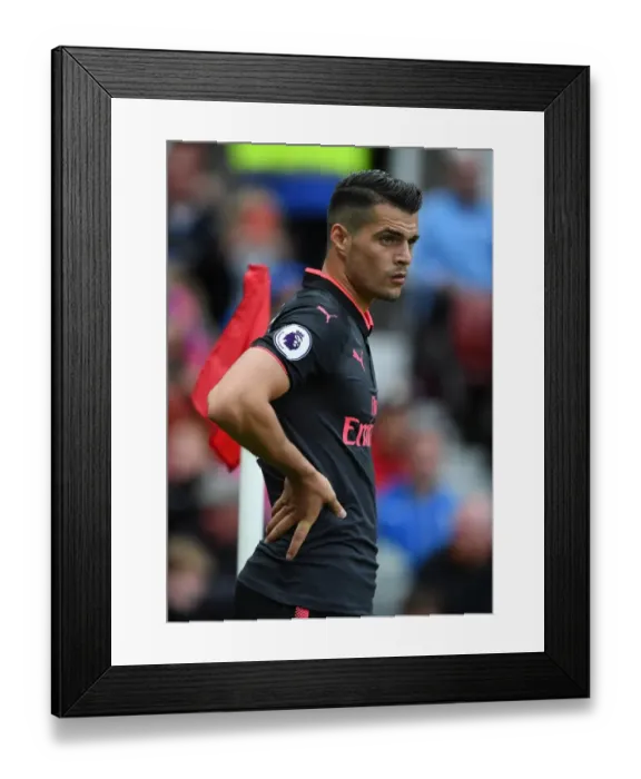 Framed Print : Granit Xhaka: Arsenal's Midfield Maestro in Action against Stoke City, Premier League 2017-18