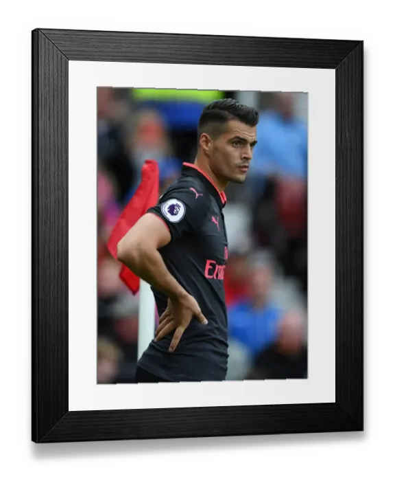 Framed Print : Granit Xhaka in Action: Stoke City vs. Arsenal, Premier League 2017-18