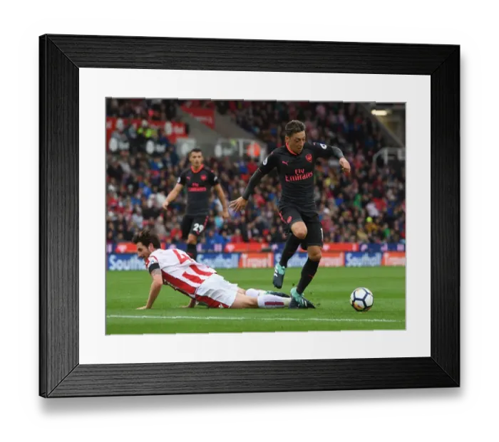 Framed Print : Mesut Ozil vs Joe Allen: Battle in the Midfield - Stoke City vs Arsenal (2017-18)