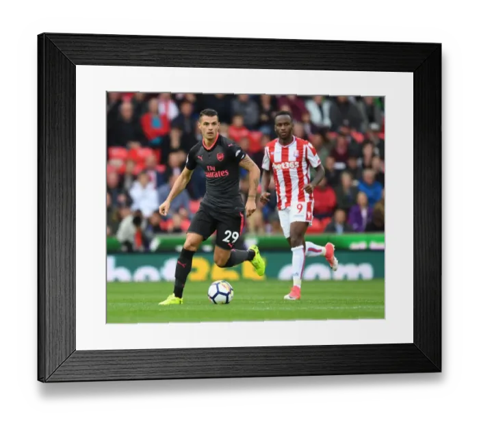 Framed Print : Xhaka Overpowers Berahino: Stoke City vs Arsenal, Premier League 2017-18 Framed Print : Xhaka Overpowers Berahino: Stoke City vs Arsenal, Premier League 2017-18