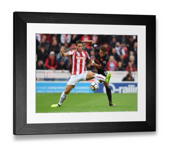 Framed Print : Clash at the Bet365: Oxlade-Chamberlain vs Pieters Framed Print : Clash at the Bet365: Oxlade-Chamberlain vs Pieters