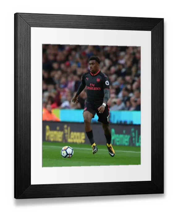Framed Print : Alex Iwobi (Arsenal). Stoke City 1: 0 Arsenal. Premier League. Bet365 Stadium, Stoke Framed Print : Alex Iwobi (Arsenal). Stoke City 1: 0 Arsenal. Premier League. Bet365 Stadium, Stoke