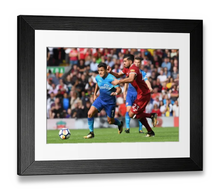 Framed Print : Clash of the Stars: Sanchez vs. Can - Premier League Showdown Framed Print : Clash of the Stars: Sanchez vs. Can - Premier League Showdown