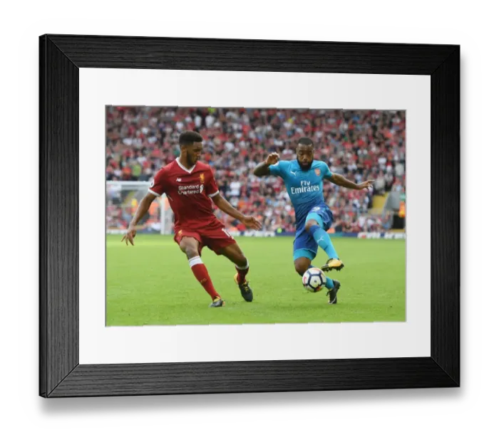 Framed Print : Clash of Titans: Lacazette vs. Gomez in Liverpool v Arsenal Premier League Showdown