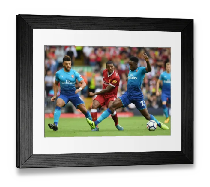 Framed Print : Clash at Anfield: Oxlade-Chamberlain and Welbeck Go Head-to-Head with Wijnaldum