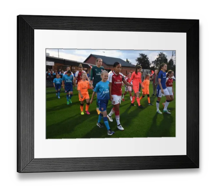 Framed Print : Alex Scott Leads Arsenal Ladies Out Against Everton Ladies in Pre-Season Friendly